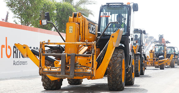 JCB telescopic forklifts cross the ramp