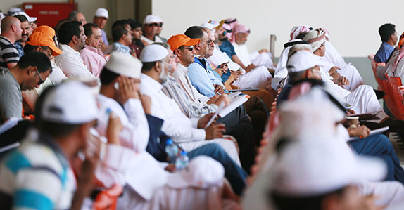 Onsite bidders at Ritchie Bros. Sep 2015 auction in Dubai