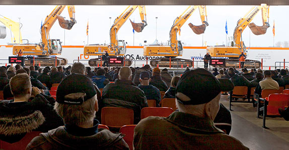 Excavators selling at Ritchie Bros.' Moerdijk auction in 2013