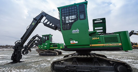Some short wood log loaders at Ritchie Bros. Prince George auction in November